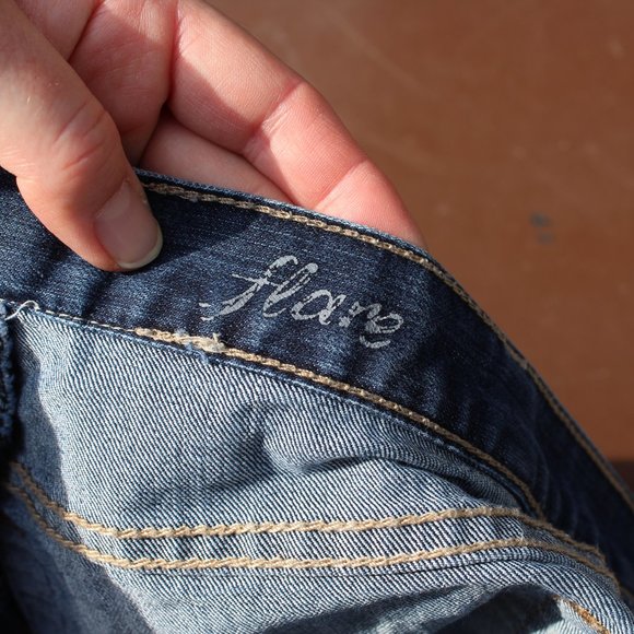 Calvin Klein Cut-Off Jean Shorts - Picture 8 of 10